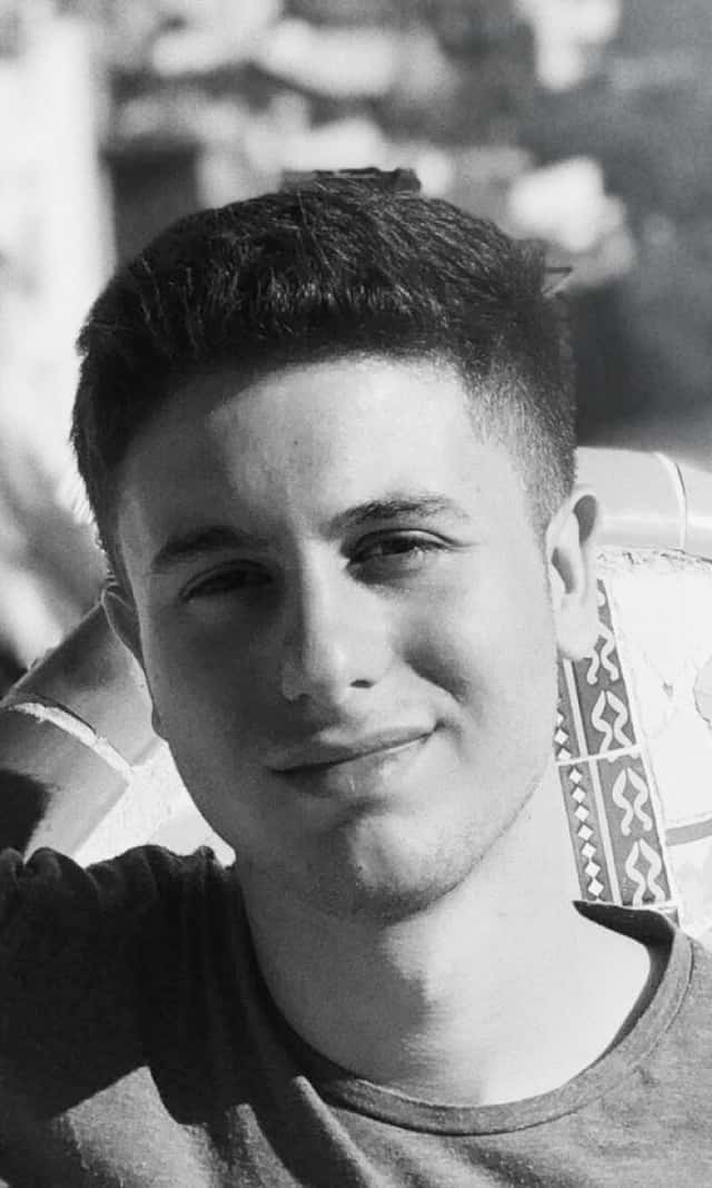 A blured portrait picture of Giuliano